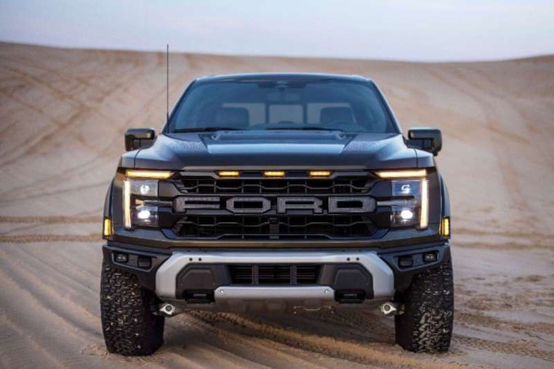2024 Ford F-150 Raptor R truck driving in sand