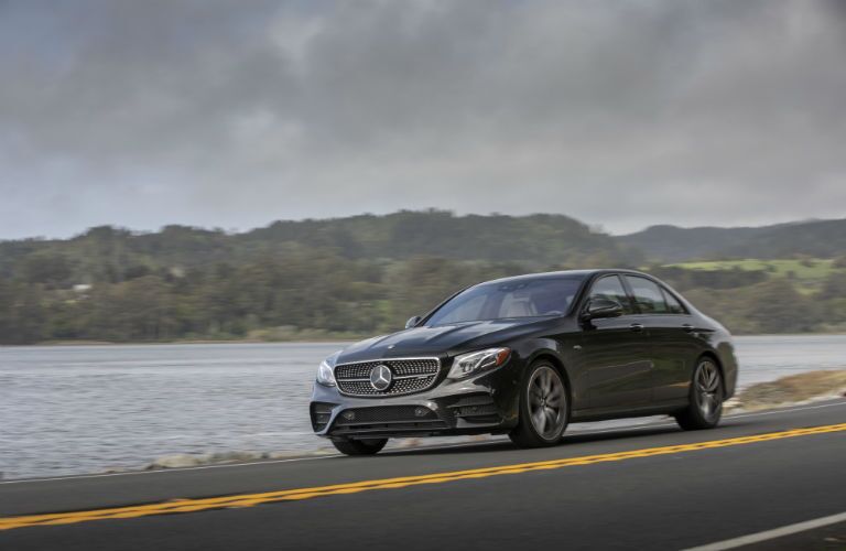 2019 MB E-Class exterior front fascia and driver side on lake side highway