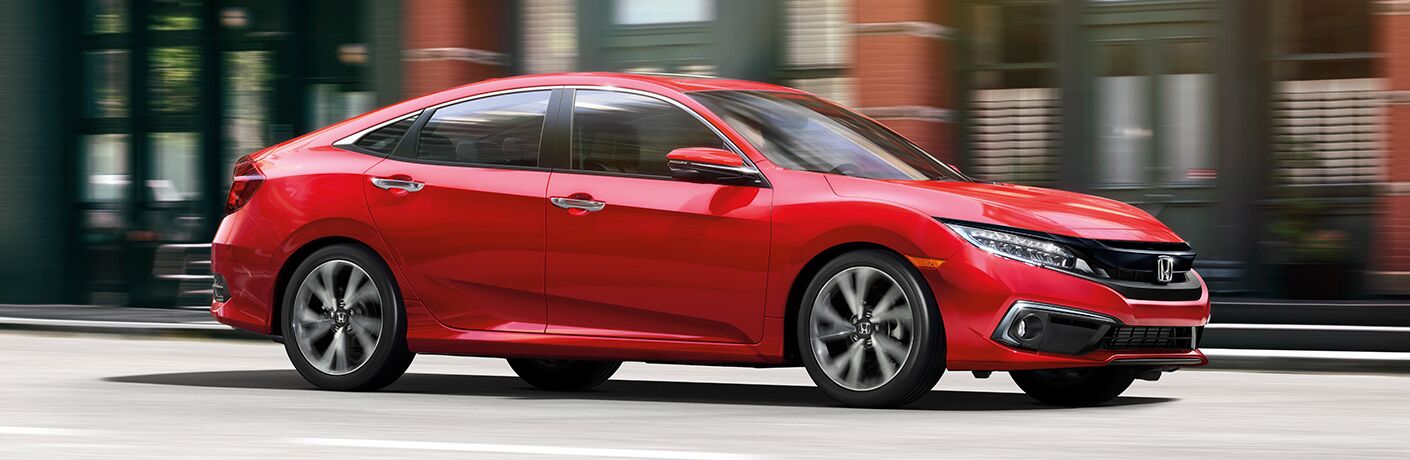 Red 2019 Honda Civic Sedan on a City Street
