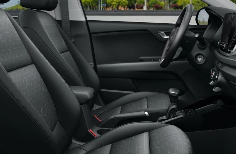 The interior seats of the 2023 Kia Rio is shown.