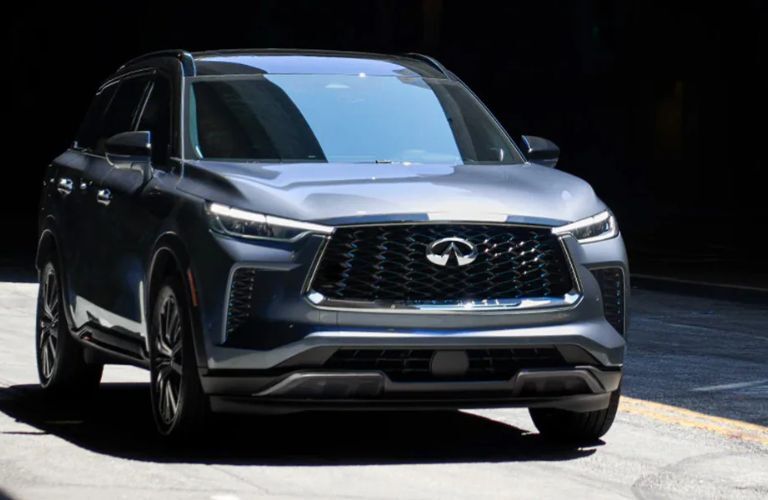 A 2024 INIFINITI QX60 on a smooth road