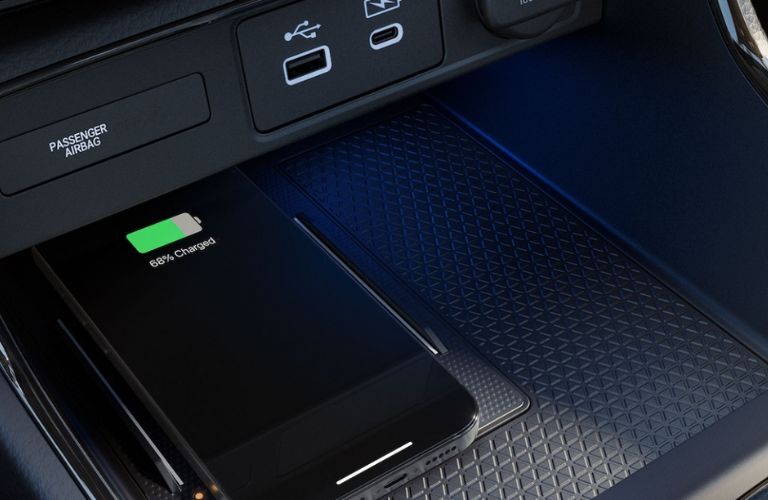 The wireless charging feature of the 2023 Honda CR-V hybrid vehicle is shown.