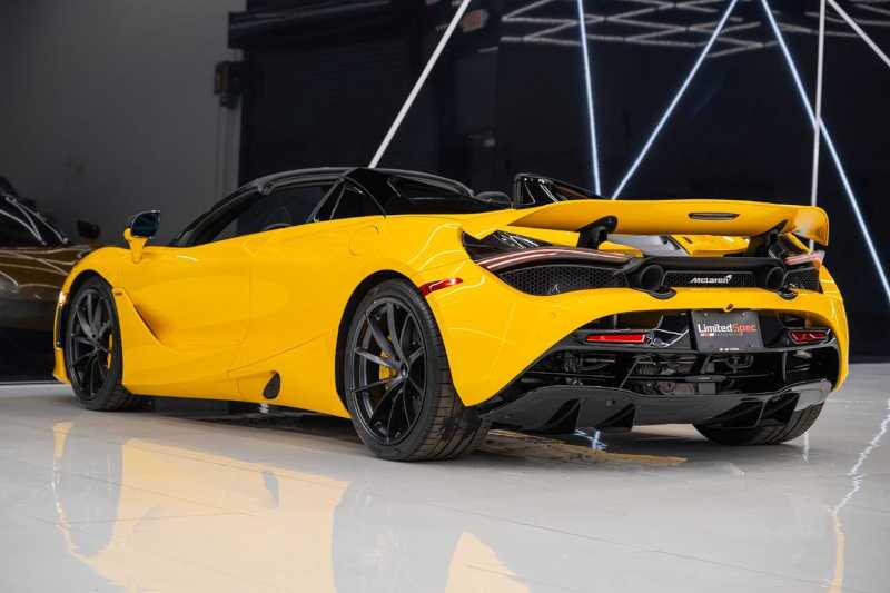 A rear quarter exterior view of the Pre-Owned McLaren 720S Performance for Sale