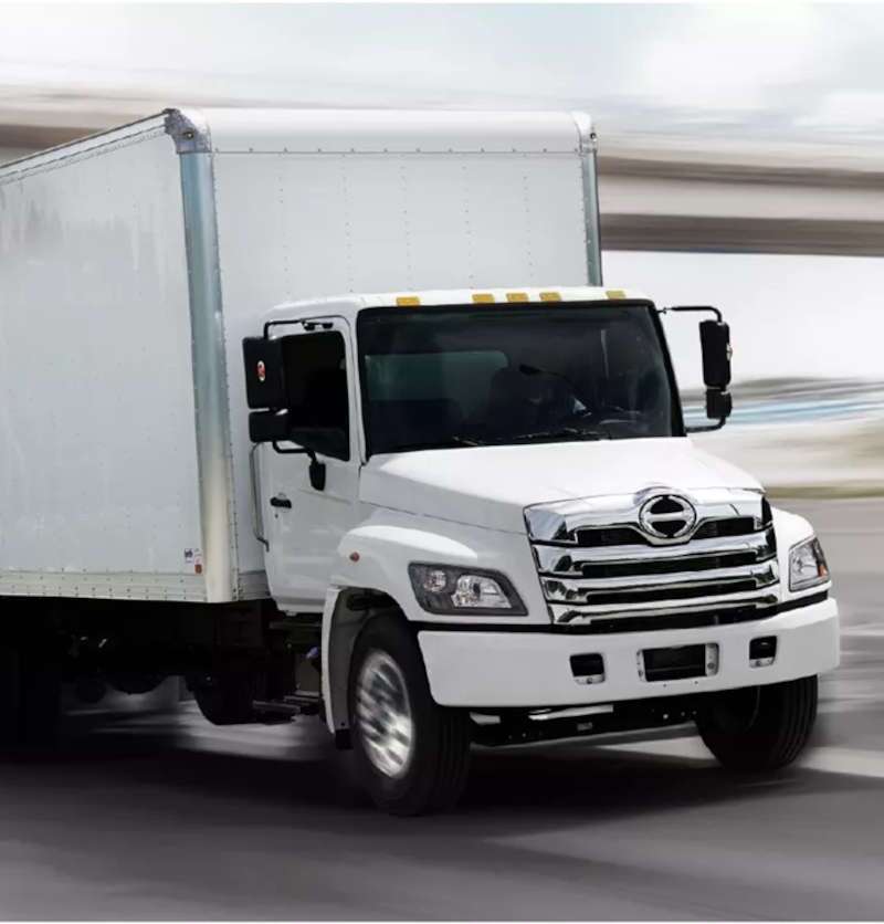 A front quarter view of a Hino box truck