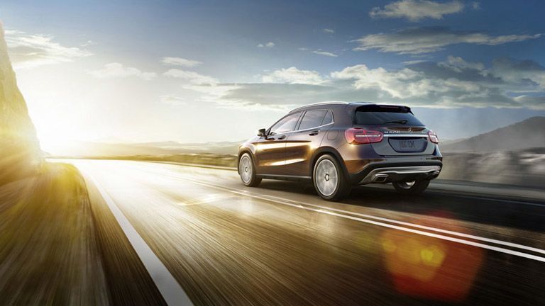 2016 Mercedes-Benz GLA driving into the sunset