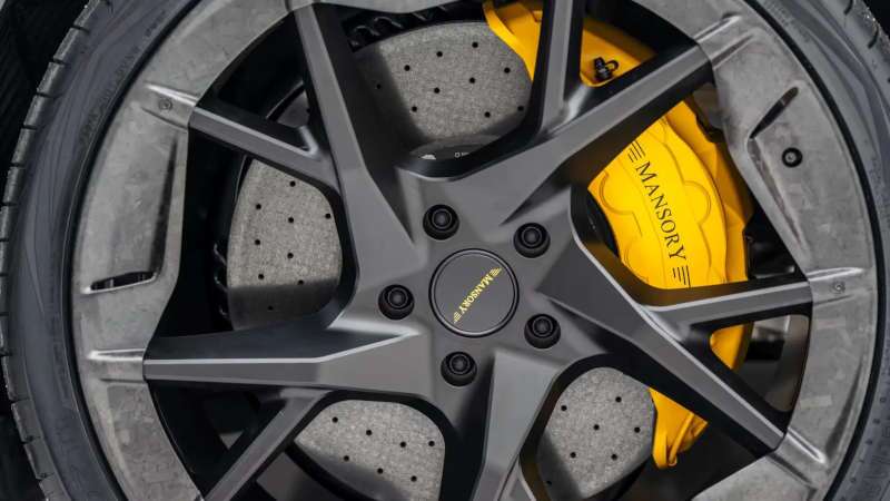 A rear quarter exterior view of the Lamborghini Urus Mansory