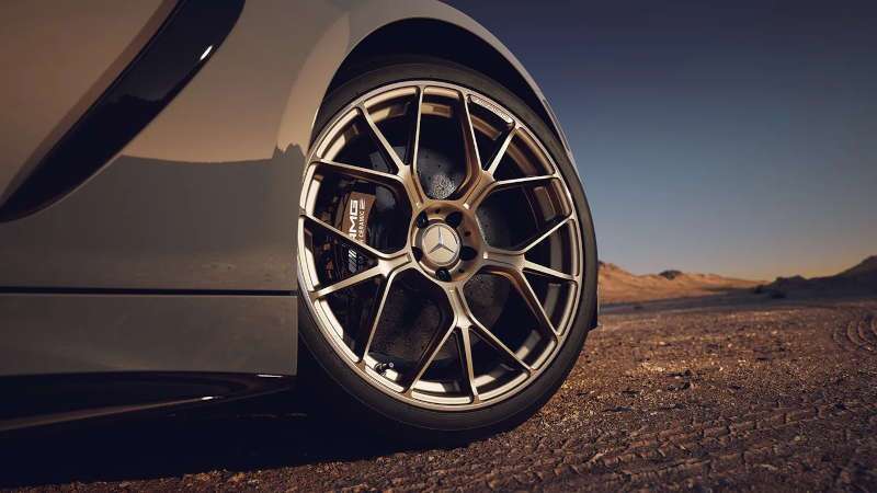 The massive front wheel and brakes on the Mercedes-Benz AMG® GT 63 Coupe