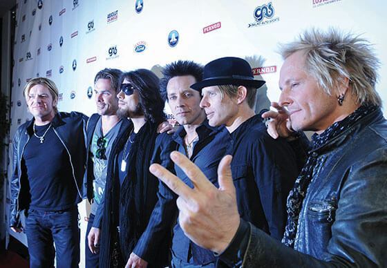 Stars line up for photos celebrating Galpin Auto Sports