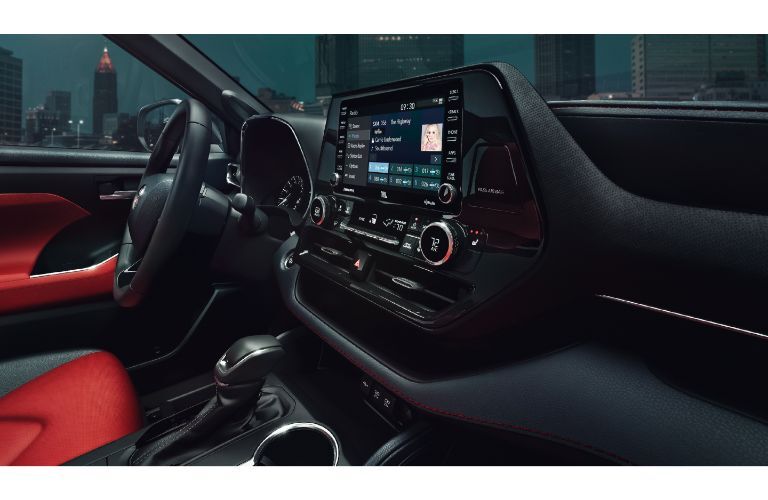 2021 Toyota Highlander Interior angled view of dashboard screen and steering wheel