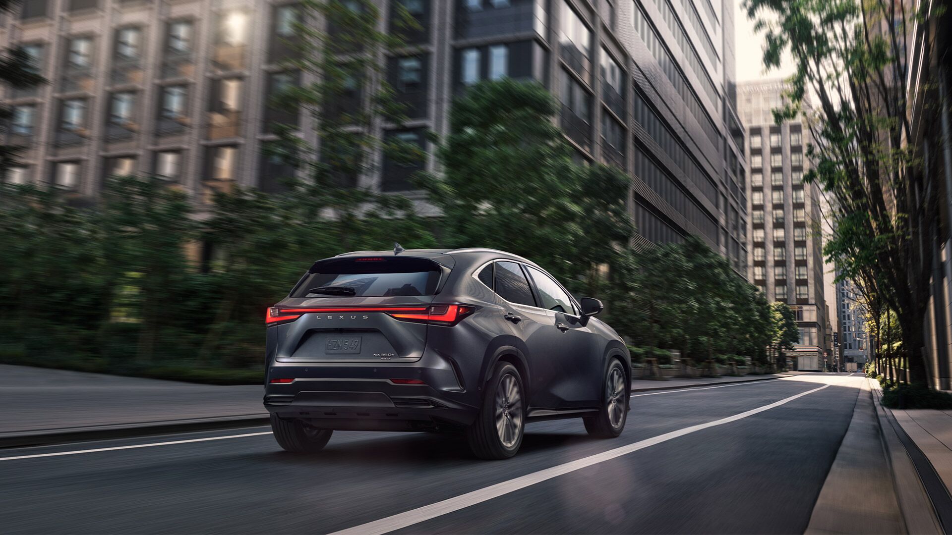 Exterior of the Lexus NX Hybrid shown in Cloudburst Gray.