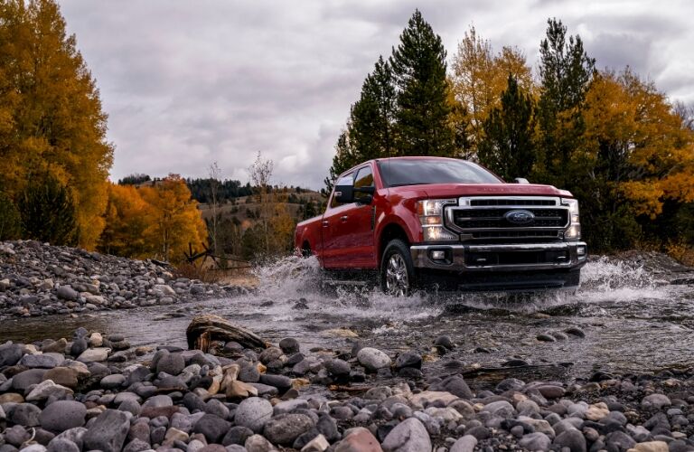 2020 Ford Super Duty driving through puddle