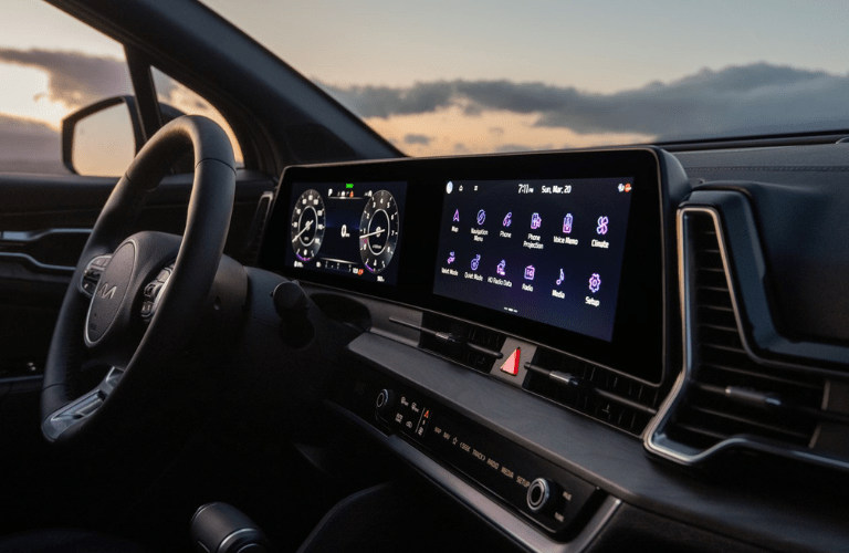 2024 Kia Sportage steering wheel and dashboard