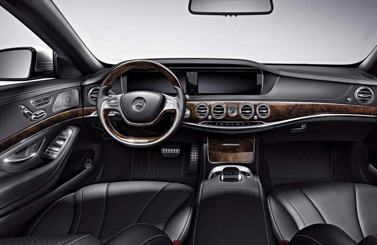 Steering wheel and dashboard inside the 2017 Mercedes-Benz S-Class sedan