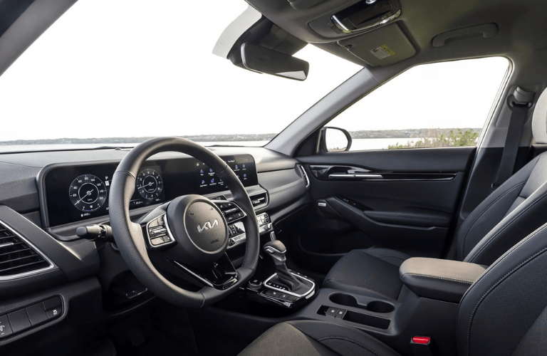 2024 Kia Seltos steering wheel and dashboard