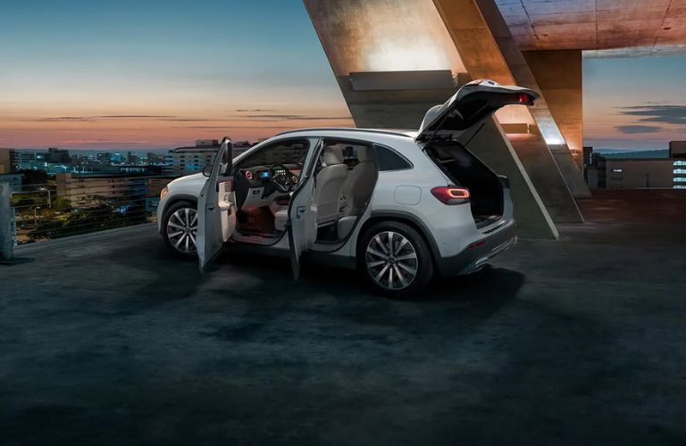 The 2024 Mercedes-Benz GLA with open doors and tailgate