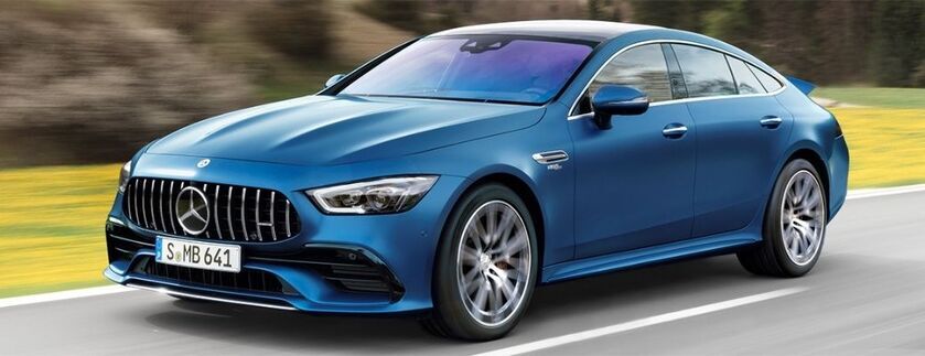 2022 Mercedes-AMG GT 4-Door Coupe Blue driving on the road 