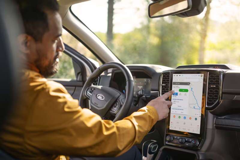 A man using the navigation system in the 2025 Ford Ranger.