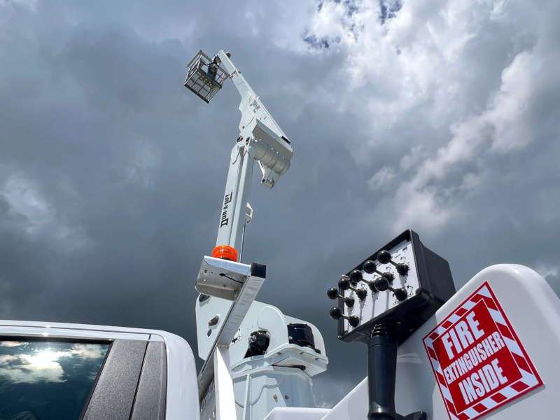 The controls and mechanical arm in a bucket truck