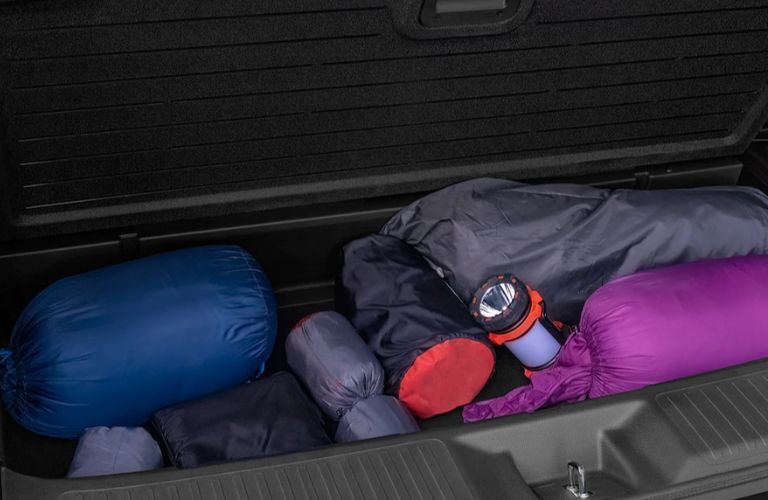 The back storage compartment of the 2023 Honda Passport is shown.
