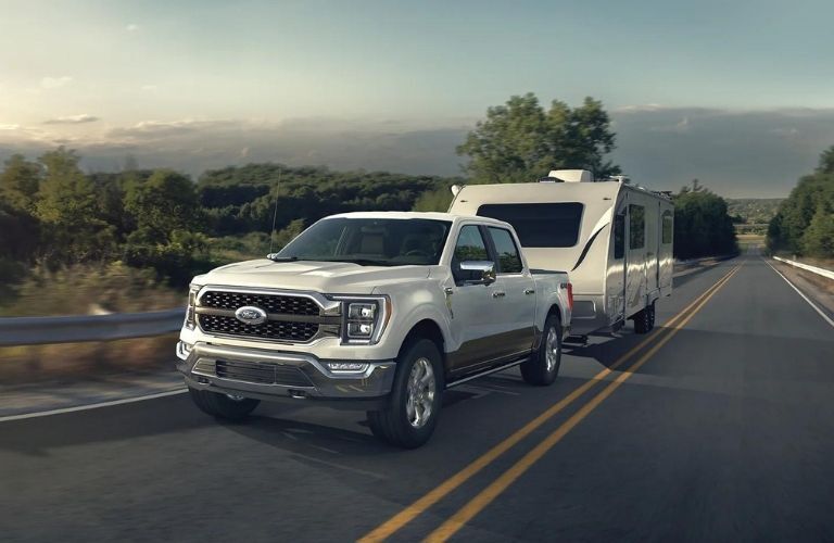 A 2021 Ford F-150 towing a trailer