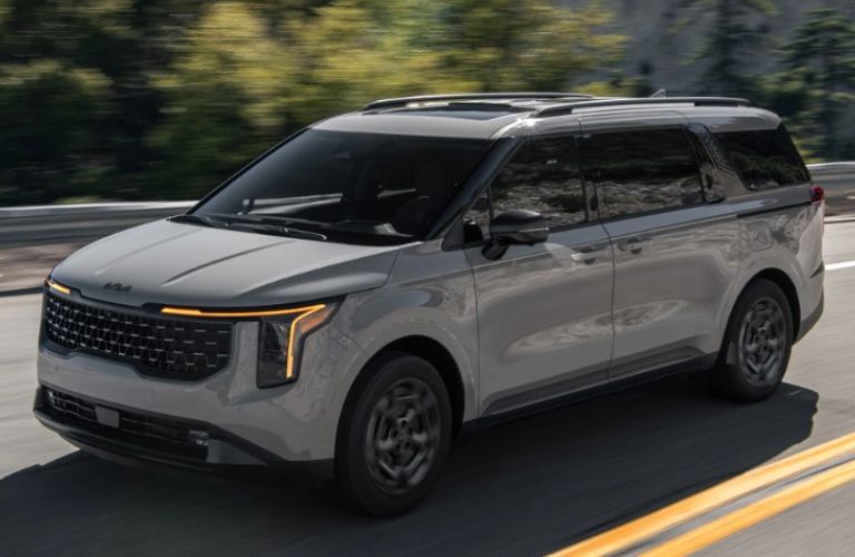 2025 Kia Carnival MPV Hybrid front and side view