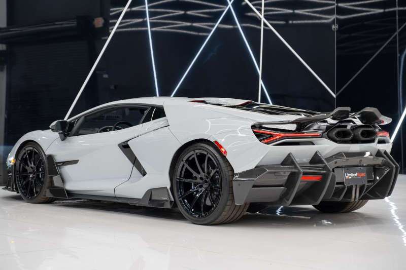 A 3/4 rear exterior view of the Lamborghini Revuelto Mansory