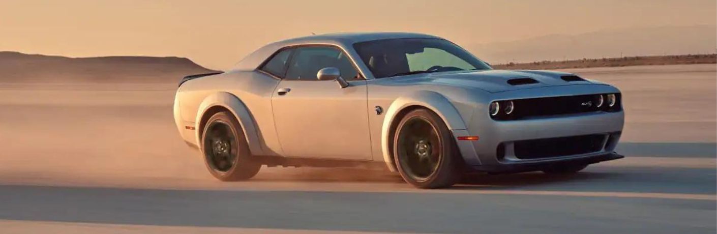 Front three-quarter view of the 2020 Dodge Challenger driving
