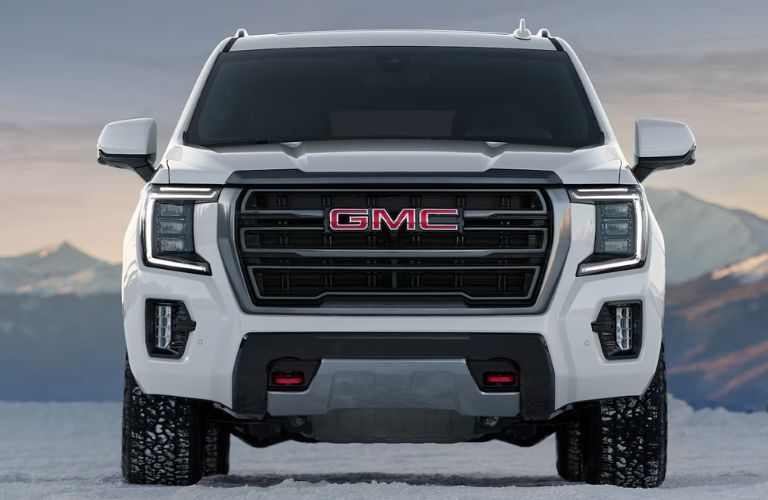 Front view of a 2024 GMC Yukon in snow