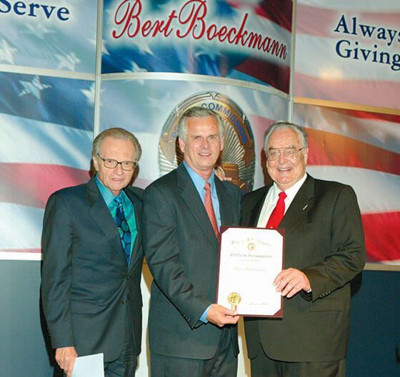 Bert being rewarded for his service by Governor Gray Davis and Larry King