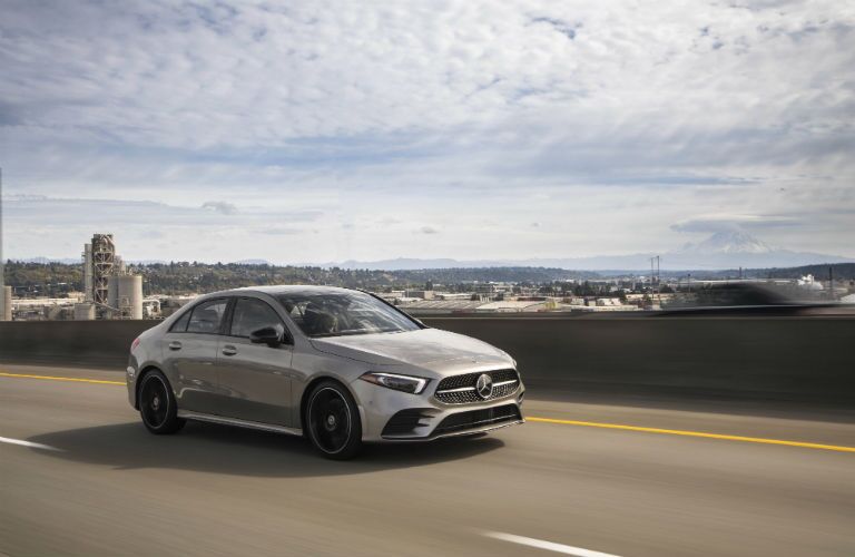 2019 MB A-Class exterior front fascia and passenger side going fast on highway