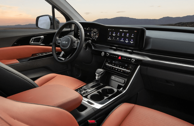 2024 Kia Carnival steering wheel and dashboard