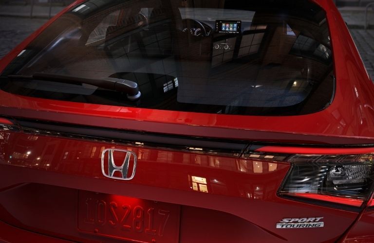 Image showing the rear section of a red 2022 Honda Civic Hatchback Sport trim