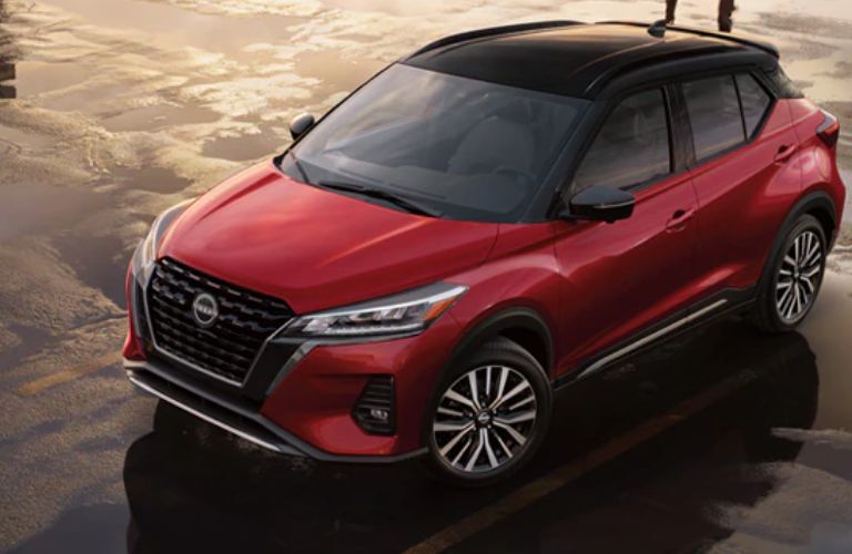 A 2022 Nissan Kicks on a wet road
