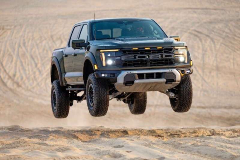 2024 Ford F-150 Raptor R truck driving in sand