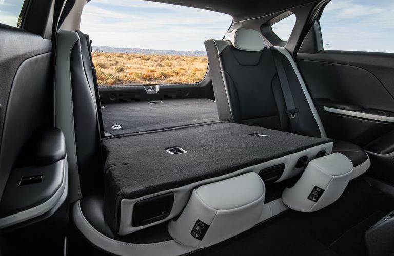 rear seats folded down of the 2026 Kia K4 Hatchback