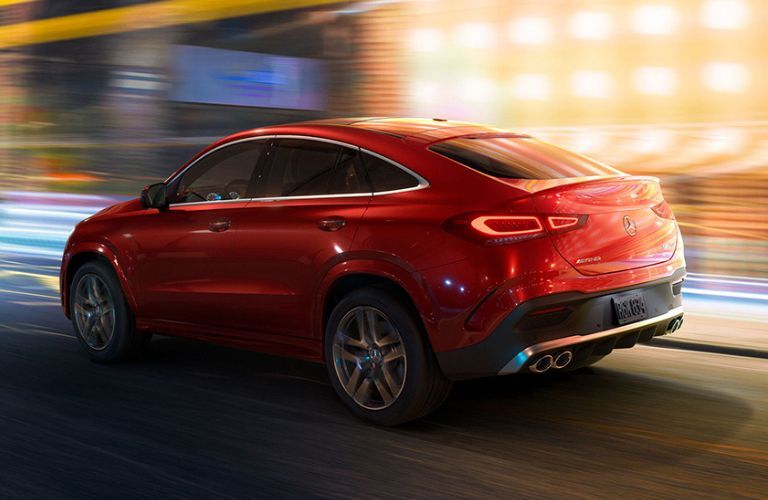Rear view of the 2024 Mercedes-AMG GLE 53 Coupe driving