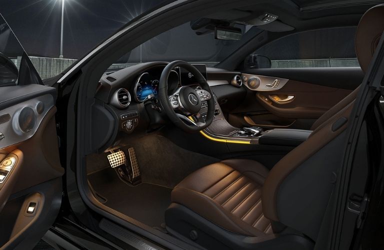 The side view of the cockpit of the 2021 Mercedes-Benz C-Class Coupe.