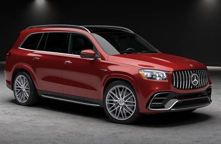 2024 Mercedes-Benz GLS 63 4MATIC+ parked in a showroom with high lights