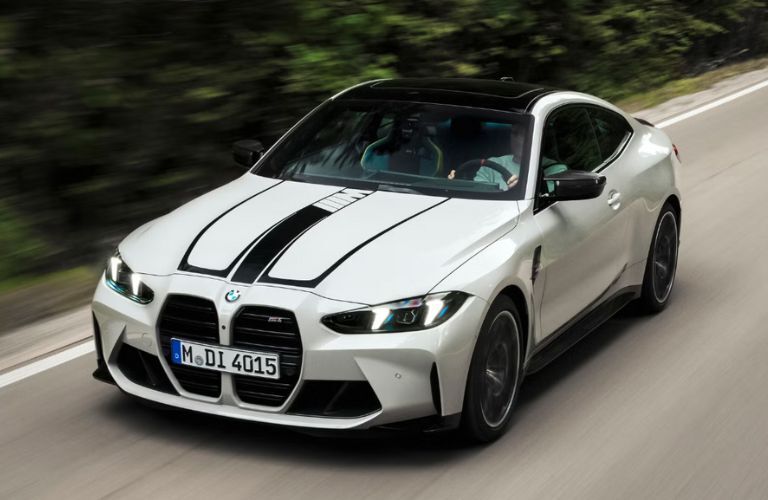 2025 BMW M4 on the road