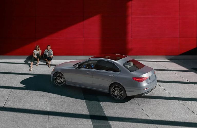 aerial side view image of the 2025 Mercedes-Benz C 300 4MATIC® Sedan