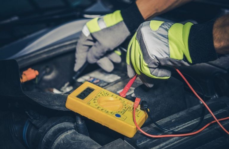 Technician doing battery inspection