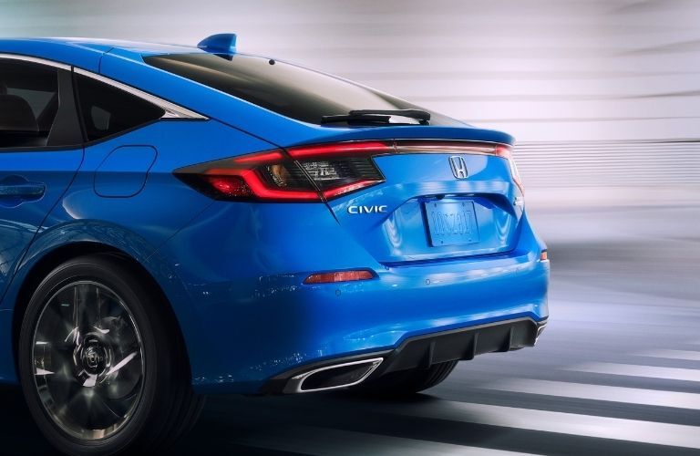 Image showing the rear sloping tail section of  a blue 2022 Honda Civic Hatchback