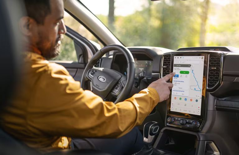 2025 Ford Ranger Lariat with a driver