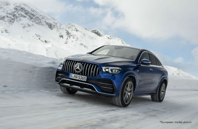 2021 MB AMG GLE Coupe exterior front fascia driver side on blurred snowy road