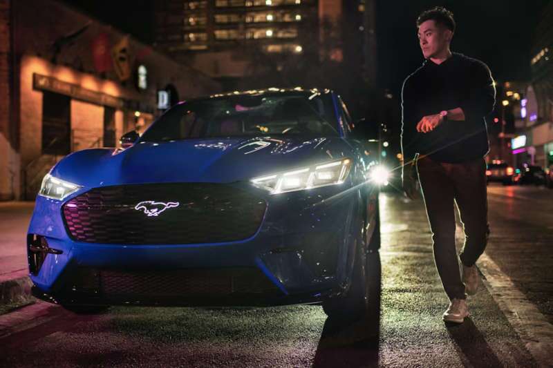 The 2024 Ford Mustang Mach-E Rally parked on a city street.