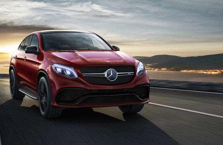 2016 Mercedes-Benz GLE-Class driving away from the sunset