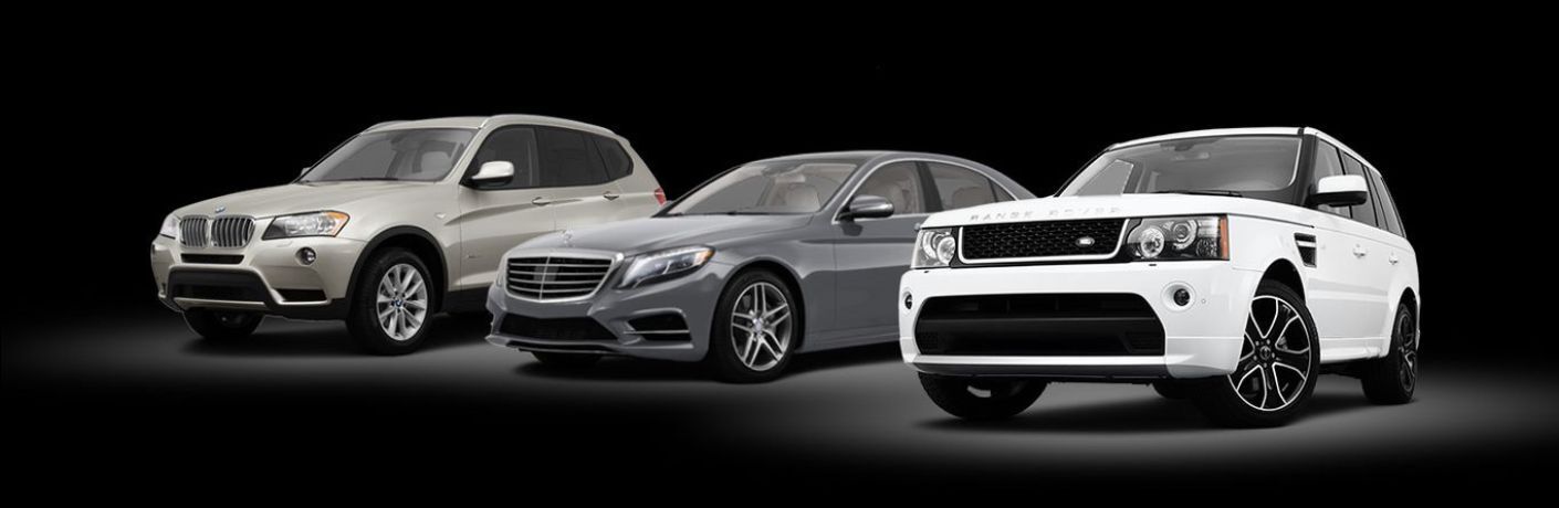 used luxury vehicles parked in a row