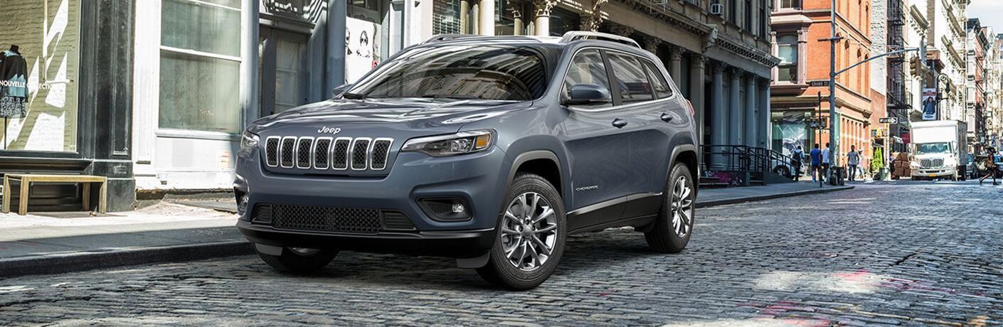 2019 Jeep Cherokee parked at the side of the city road.