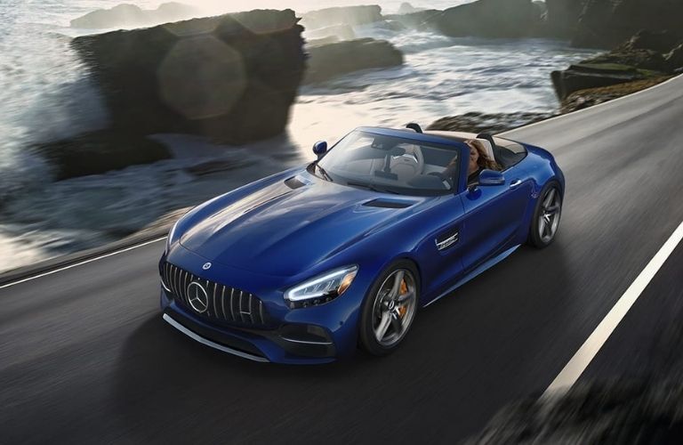 2021 AMG® GT Roadster on a beach road