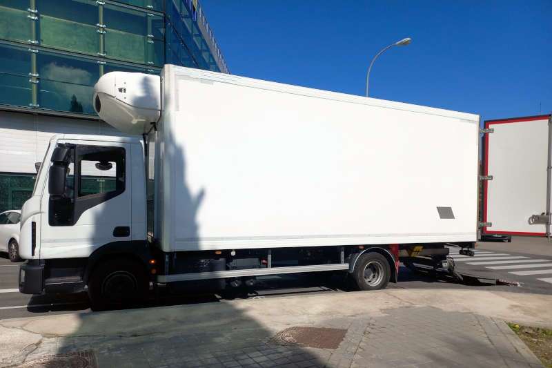 An exterior side view of a refrigerated truck